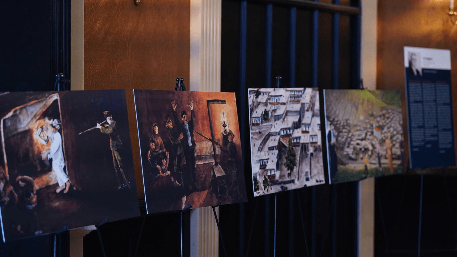 Artwork documenting Crimean Tatar history displayed at a community exhibition.